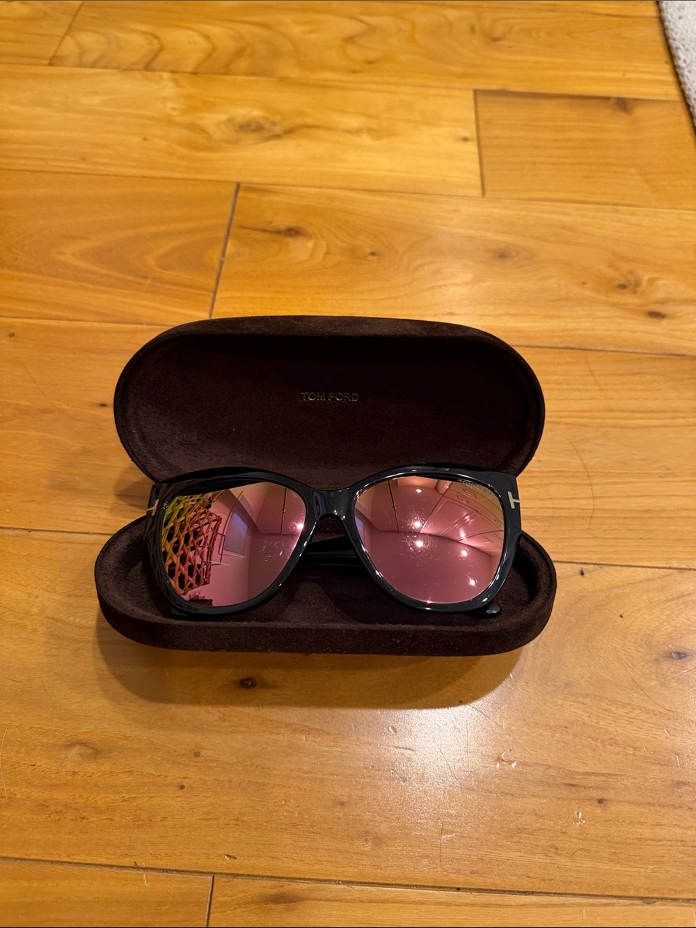Tom Ford Women’s Black Sunglasses with Pink Mirrored Lenses